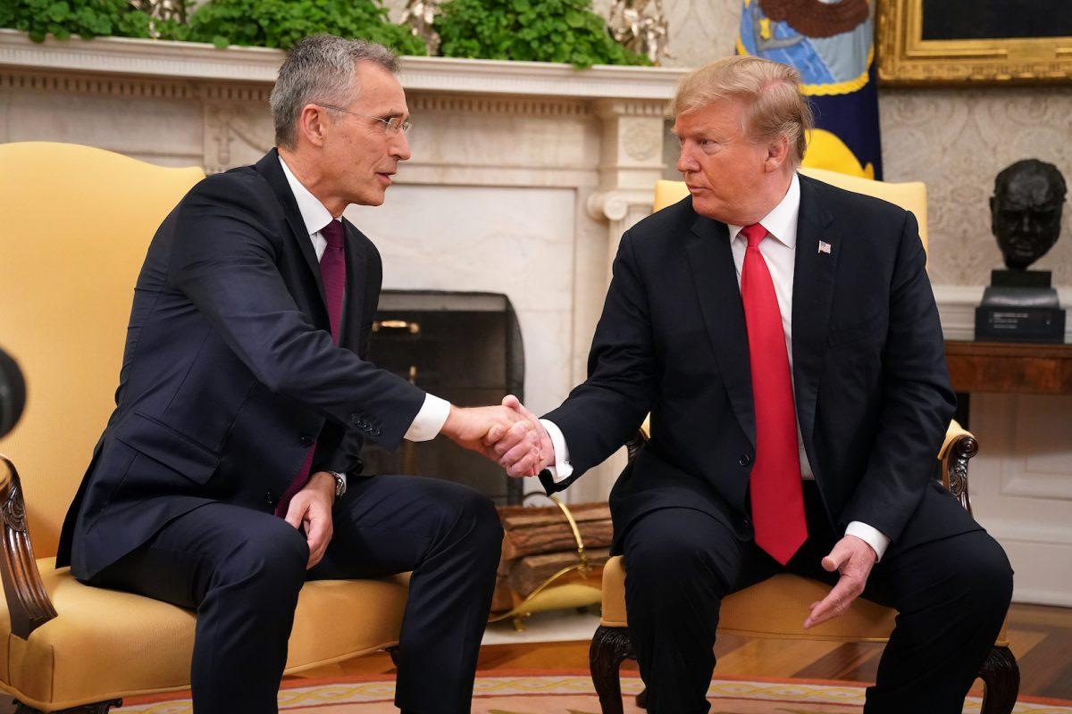 NATO Secretary General Jens Stoltenberg and President Donald Trump shake hands in the Oval Office at the White House on April 2, 2019. (Chip Somodevilla/Getty Images)