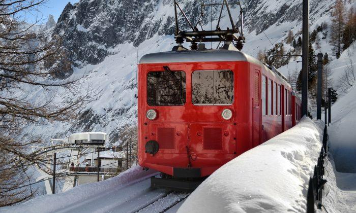 Men Spot Something Get Buried in Snow As Train Passes By, Start Digging to Save Its Life