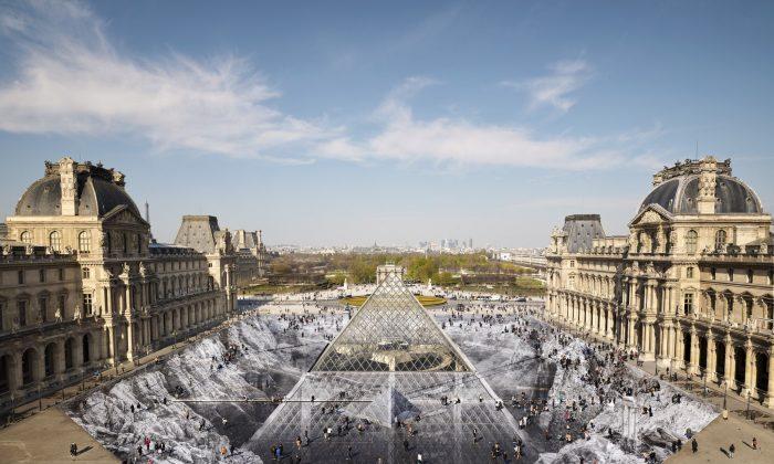 Visitors Ruin Artwork Outside Louvre Museum in Paris