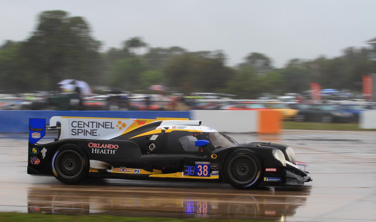  The #38 Performance Tech P2 Oreca drivers and crew showed their experience on the way to a class win. (Chris Jasurek/Epoch Times)