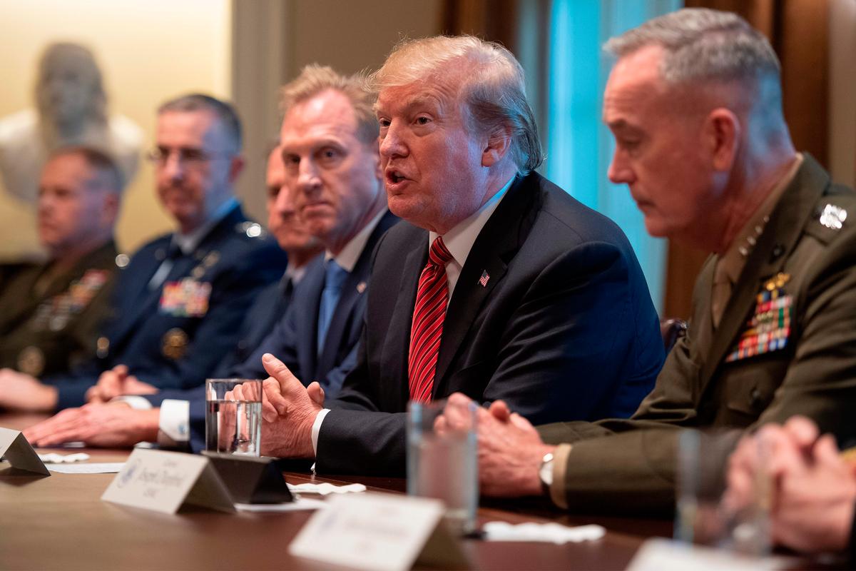 President Donald Trump is briefed by senior military leaders at the White House in Washington. (Jim Watson/AFP/Getty Images)