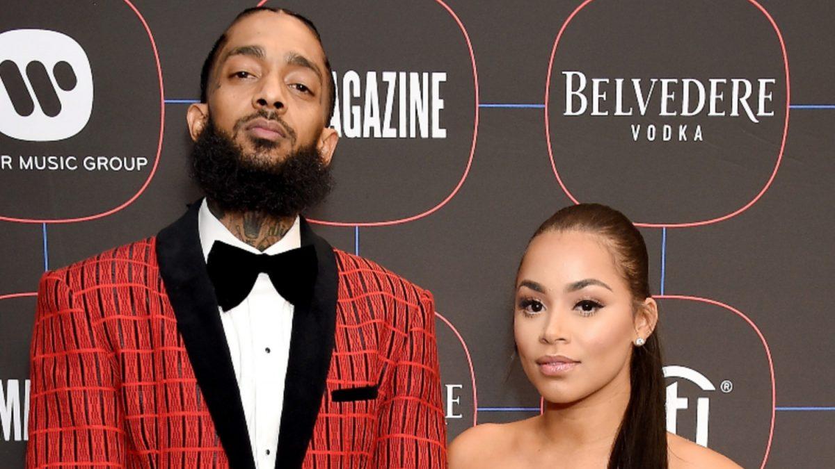 The rapper Nipsey Hussle, who was shot dead in late March, and Lauren London in Los Angeles, on Feb. 7, 2019. (Gregg DeGuire/Getty Images)