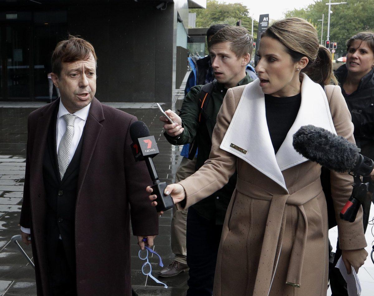 Shane Tait, left, a lawyer acting for Brenton Harrison Tarrant, talks with media outside the High Court in Christchurch, New Zealand, on April 5, 2019. (Mark Baker/AP Photo)