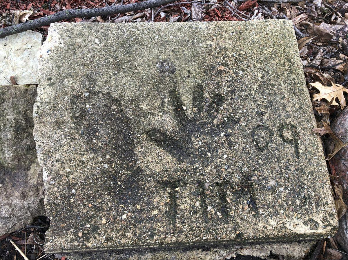 A slab of concrete sits in the backyard of the house where Timmothy Pitzen used to live in Aurora, Ill., on April 4, 2019. (Carrie Antlfinger/AP Photo)