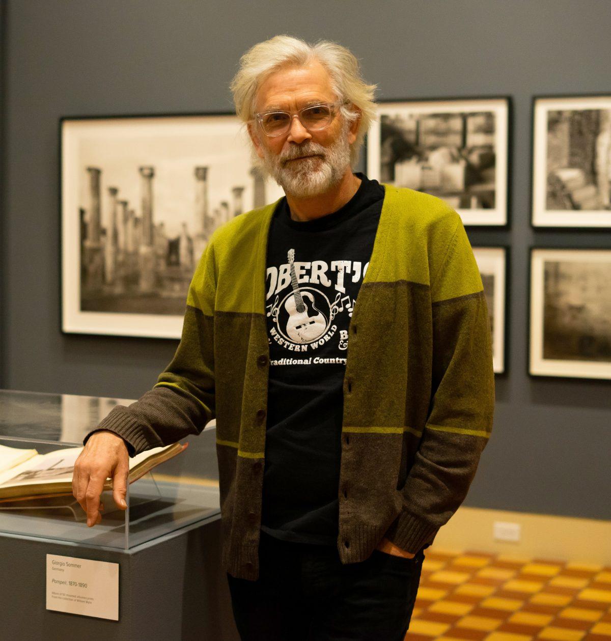 William Wylie at his “Pompeii Archive: Photographs by William Wylie” exhibition at the Fralin Museum of Art at the University of Virginia. (Riley Walsh/The Cavalier Daily)