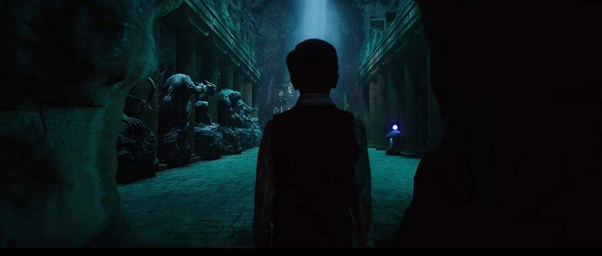 Billy Batson (Asher Angel) discovers the cave of the wizard Shazam in “Shazam!” (Warner Bros./DC Entertainment)