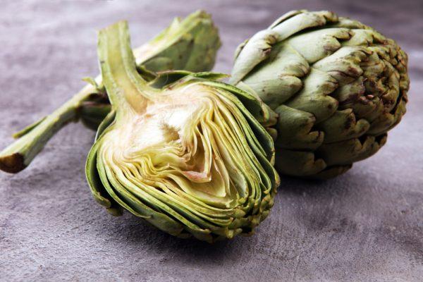 Artichokes' sturdy and spiky outer leaves protect a delicate heart, which can be eaten raw, simply dipped in your best extra virgin olive oil and salt. (Shutterstock)