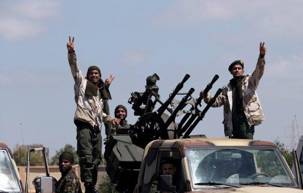 Libyan National Army (LNA) members, commanded by Khalifa Haftar, head out of Benghazi to reinforce the troops advancing to Tripoli, in Benghazi, Libya, on April 7, 2019. (Esam Omran Al-Fetori/Reuters)
