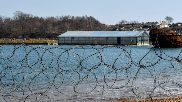 A bay with enclosures with nearly 100 whales held captive is seen through a razor barbed wire, in Russia's far eastern Primorye region, Russia, on April 6, 2019. (Yuri Maltsev via Reuters)