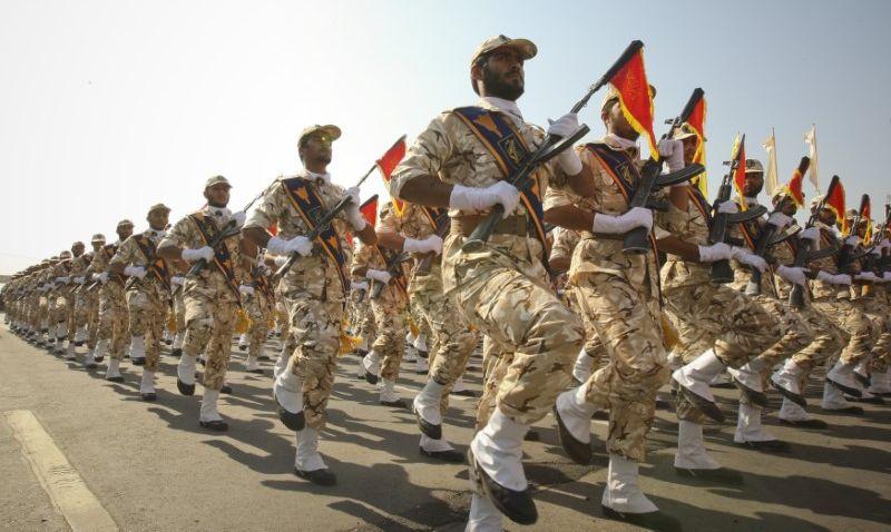 Members of the Iranian revolutionary guard march during a parade to commemorate the anniversary of the Iran-Iraq war (1980-88), in Tehran . (Reuters/Stringer)