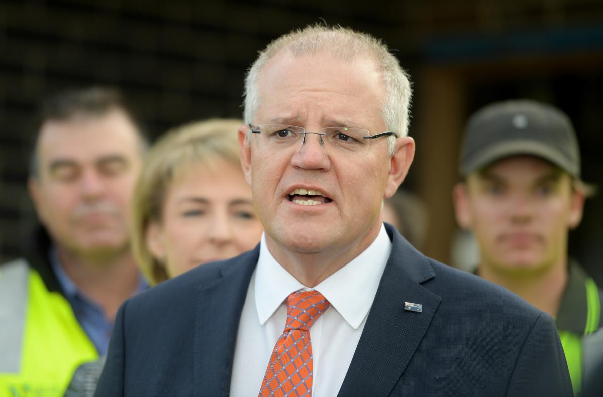 Prime Minister Scott Morrison and Small Business Minister Michaelia Cash during a press conference after a BBQ Breakfast at a residential building site in Googong, Canberra, on April 4, 2019. (Tracey Nearmy/Getty Images)