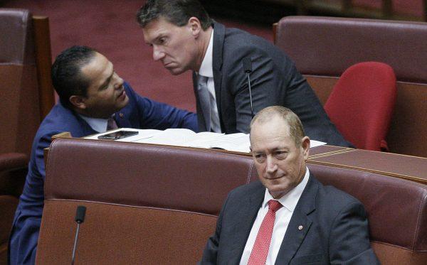 Australian Senator Fraser Anning listens to speeches calling for his censure in Parliament House in Canberra, Australia, on April 3, 2019. (Rod McGuirk/Photo via AP)