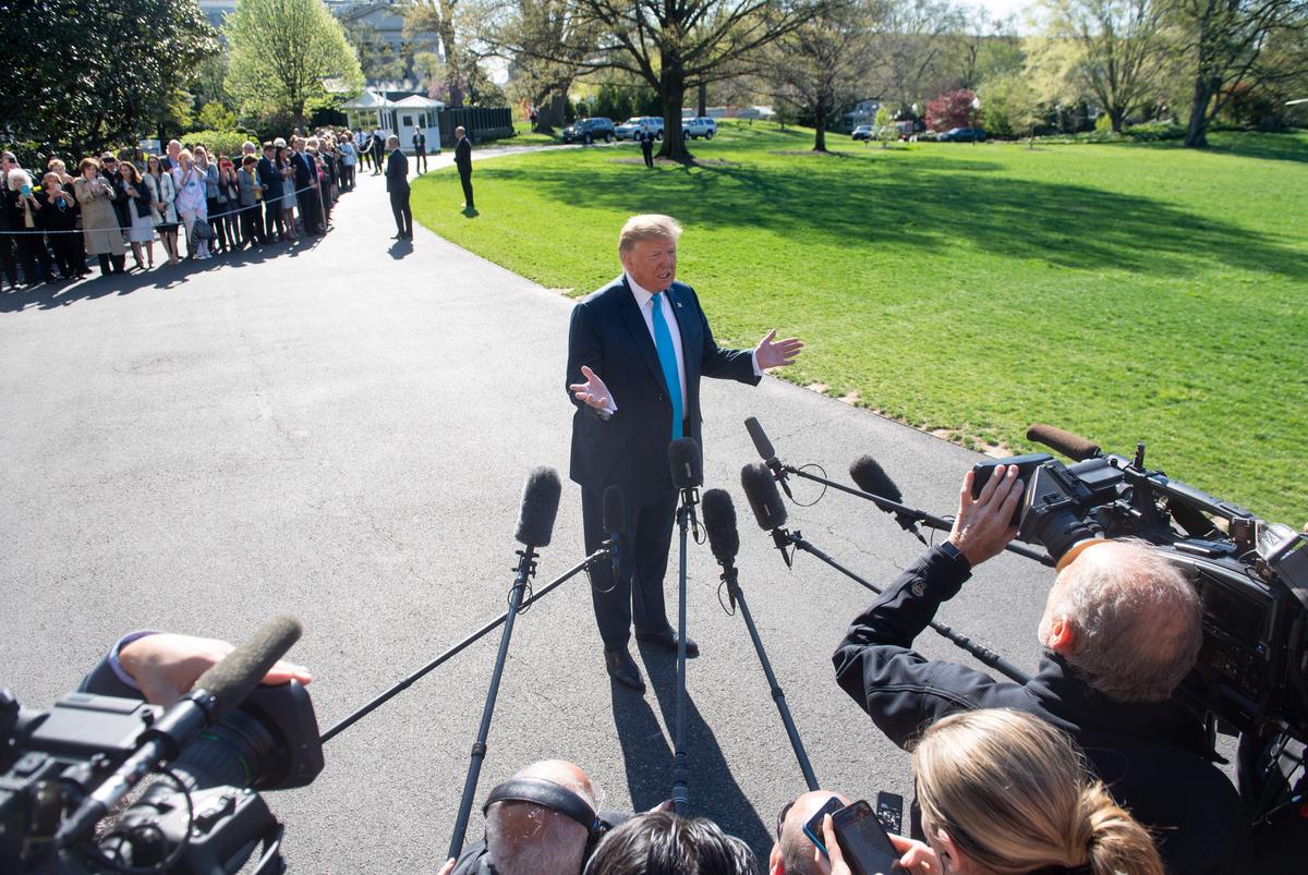 President Donald Trump speaks to the press prior to departing on Marine One from the South Lawn of the White House in Washington on April 10, 2019. (Saul Loeb/AFP/Getty Images)