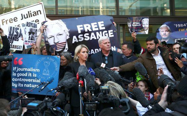 Kristinn Hrafnsson, editor in chief of Wikileaks, and barrister Jennifer Robinson talk to the media outside the Westminster Magistrates Court after WikiLeaks founder Julian Assange was arrested in London, Britain, April 11, 2019. (Hannah McKay via Reuters)
