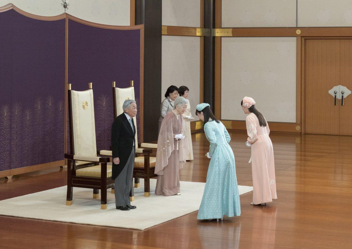 Japan's Emperor Akihito, left, and Empress Michiko, second from left, are celebrated by Princess Mako, right, and Princess Kako during a celebration marking their 60th wedding anniversary at the Imperial Palace in Tokyo, on April 10, 2019. (The Imperial Household Agency of Japan via AP)