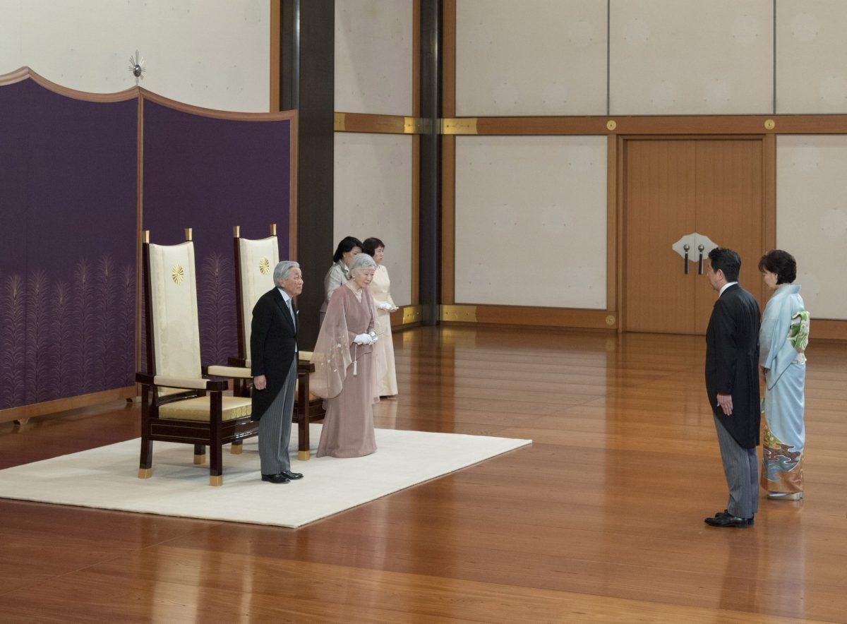 Japan's Emperor Akihito, left, and Empress Michiko, second from left, are greeted by Prime Minister Shinzo Abe and his wife Akie during a celebration marking their 60th wedding anniversary at the Imperial Palace in Tokyo, on April 10, 2019. (The Imperial Household Agency of Japan via AP)