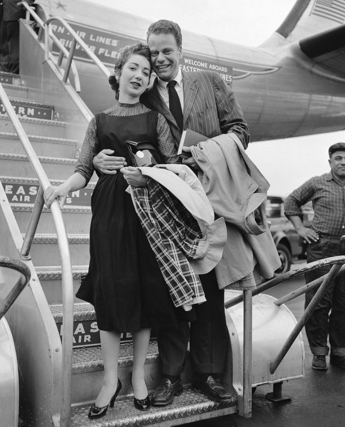 Charles Van Doren and his bride, the former Geraldine Ann Bernstein, arrive from their Puerto Rican honeymoon at the former Idlewild Airport in New York on April 2, 1957. (AP Photo, File)