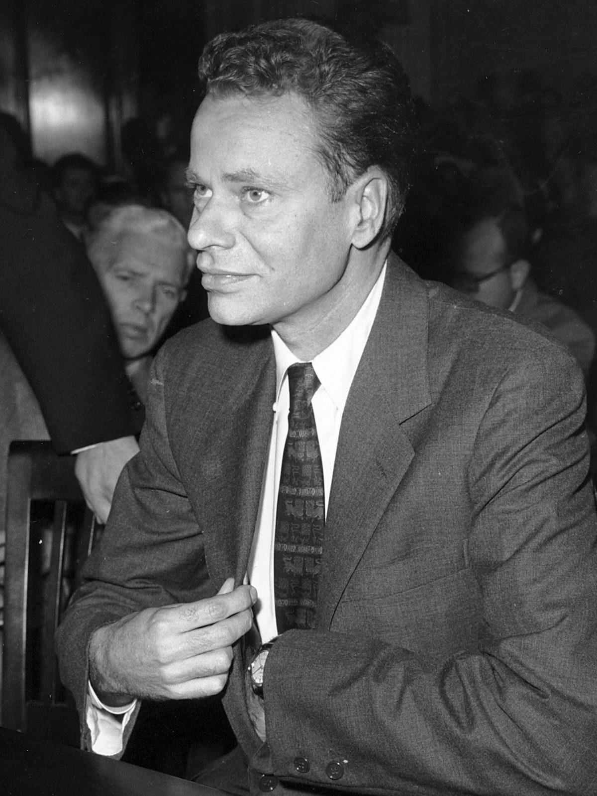 Charles Van Doren sits as a witness before Congress in Washington during a hearing on rigged television game shows on Nov. 2, 1959. (AP Photo, File)