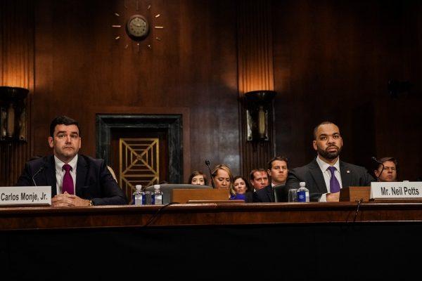Carlos Monje, Jr., Twitter director of Public Policy and Philanthropy for U.S. & Canada and Facebook policy director Neil Potts testify before a Senate Judiciary Constitution Subcommittee hearing in Washington on April 10, 2019. (Jeenah Moon/Reuters)