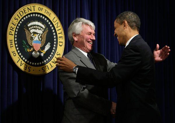 President Barack Obama (R) greets White House counsel Gregory Craig during an event at the Eisenhower Executive Office Building of the White House on Jan. 21, 2009. (Alex Wong/Getty Images)