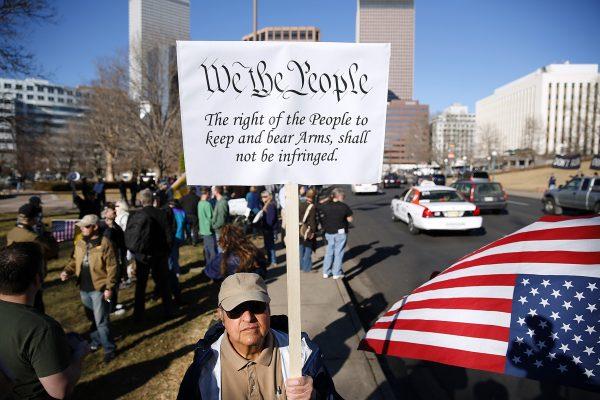 Second Amendment supporters gathered across the street from the Colorado State Capital to voice their support for gun ownership in Denver, Colo. on Jan. 9, 2013. (Marc Piscotty/Getty Images)