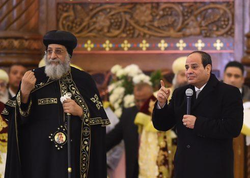 Egypt's President Abdel Fattah al-Sisi (R) speaks, as Coptic Pope Tawadros II listen on, during the inauguration of the massive Cathedral of the Nativity of Christ in Egypt's New Administrative Capital on January 6, 2019.<br/>MOHAMED EL-SHAHED/AFP/Getty Images