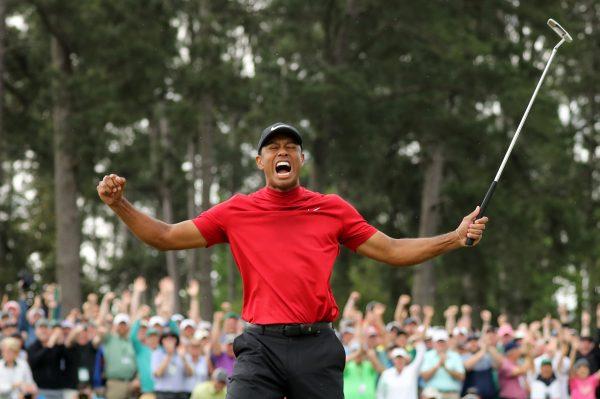 Tiger Woods celebrates on the 18th hole after winning the 2019 Masters on April 14, 2019. (Lucy Nicholson/Reuters)
