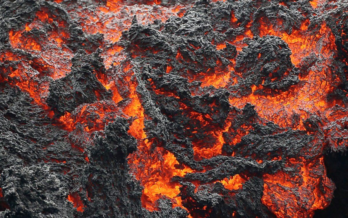 Lava flows at a lava fissure in the aftermath of eruptions from the Kilauea volcano on Hawaii's Big Island in Pahoa, Hawaii, on May 12, 2018. (Mario Tama/Getty Images)
