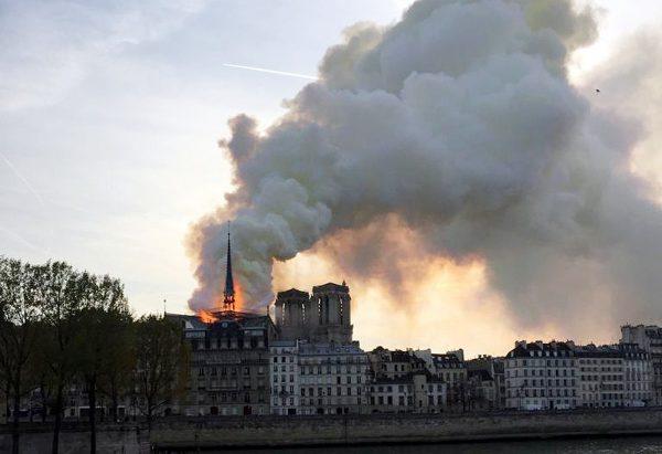 Smoke billows from the Notre Dame Cathedral after a fire broke out, in Paris, France, on April 15, 2019. (Julie Carriat/Reuters)