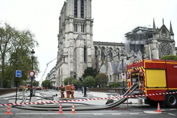 Firefighters continue to secure Notre-Dame Cathedral in Paris on April 16, 2019, in the aftermath of a fire that caused its spire to crash to the ground (Stephane De Sakutin/AFP/Getty Images)