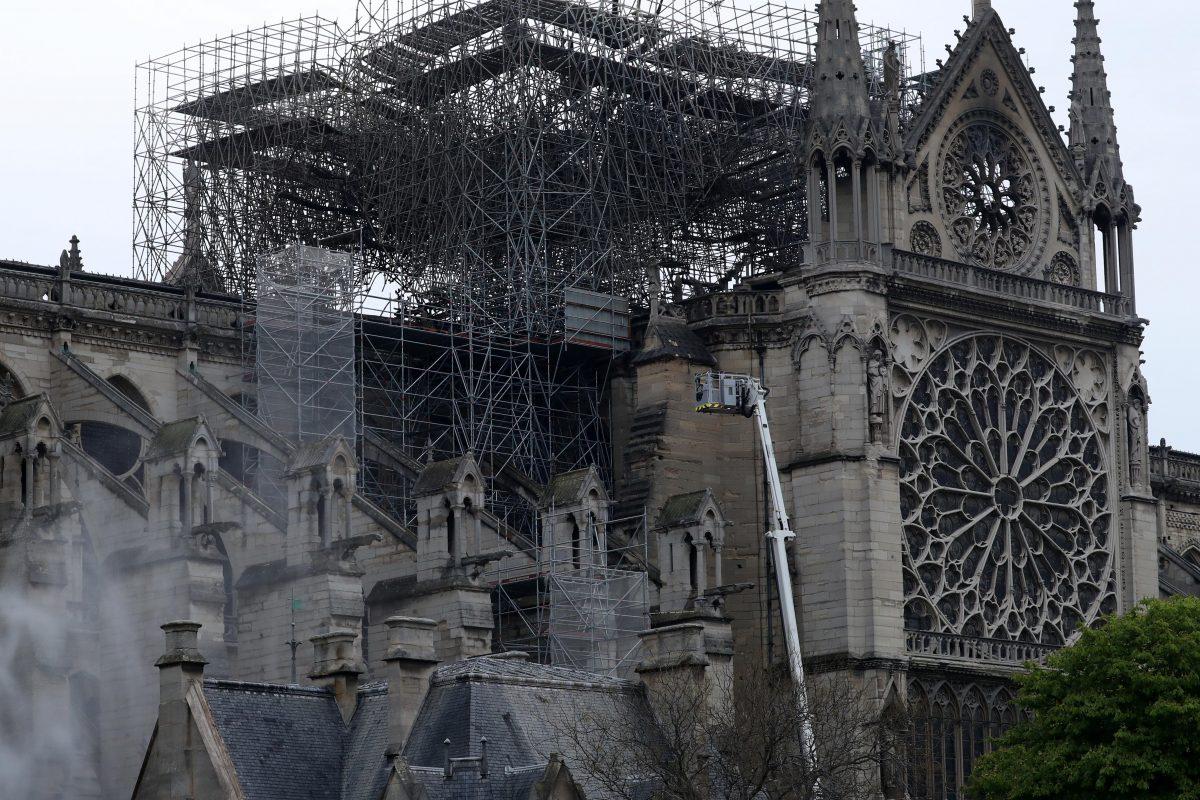Firefighters work at Notre-Dame Cathedral in Paris, France, on April 16, 2019. (Yves Herman/Reuters)