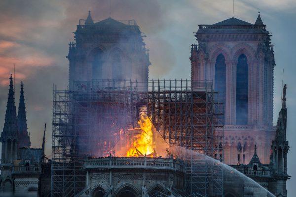 Smoke and flames rise from Notre-Dame Cathedral on April 15, 2019 in Paris, France. (Veronique de Viguerie/Getty Images)
