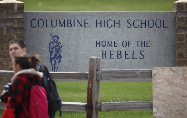 Students leave Columbine High School in Littleton, Colo., on April 16, 2019. (David Zalubowski/Photo via AP)