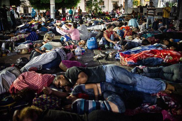 Central American migrants heading in caravan to the US rest during a stop in their journey, at park Hidalgo in Tapachula, Chiapas state, Mexico on April 13, 2019. (Pep Companys/ AFP/Getty Images)