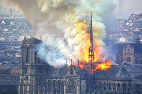 Smoke and flames rise during a fire at the landmark Notre-Dame Cathedral in central Paris on April 15, 2019. (Hubert Hitier/AFP/Getty Images)