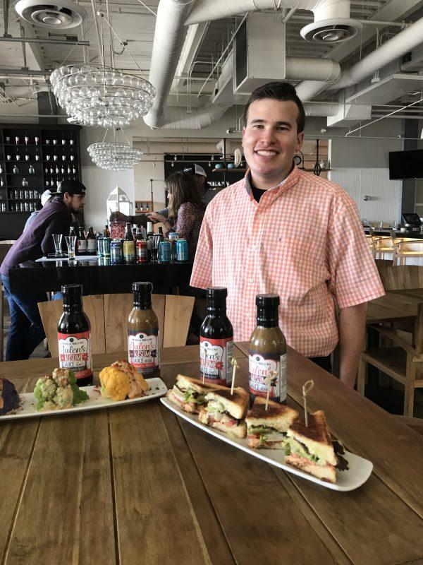 Julen Ucar at Ways & Means Oyster House with the tricolor cauliflower and salmon club sandwiches that feature his Ausome Sauce in an aioli. (Courtesy of Ways & Means Oyster House)