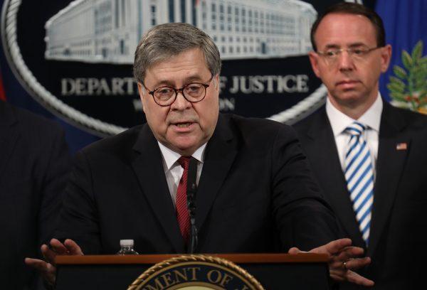 Attorney General William Barr speaks during a press conference on the release of the redacted version of the Mueller report at the Department of Justice in Wash., on April 18, 2019. (Win McNamee/Getty Images)
