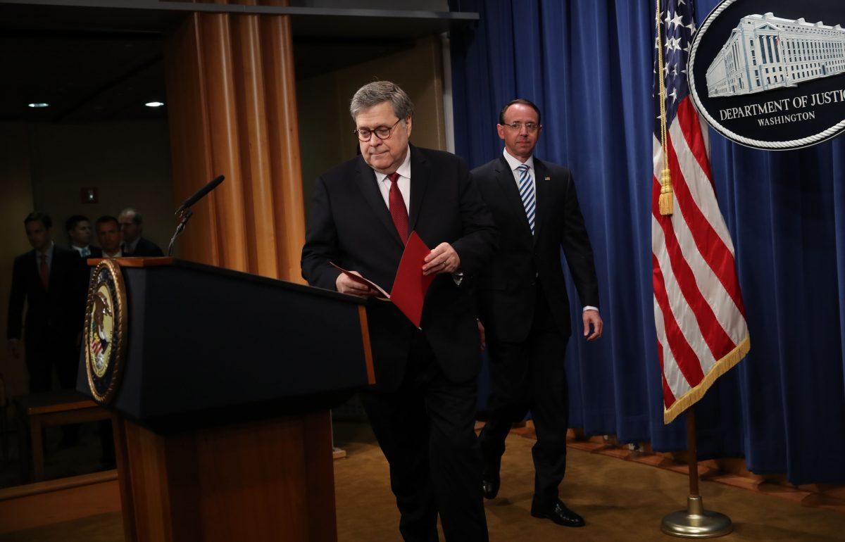 Attorney General William Barr (L) and Deputy Attorney General Rod Rosenstein arrive to speak about the release of the redacted version of the Mueller report at the Department of Justice in Washington on April 18, 2019. (Win McNamee/Getty Images)