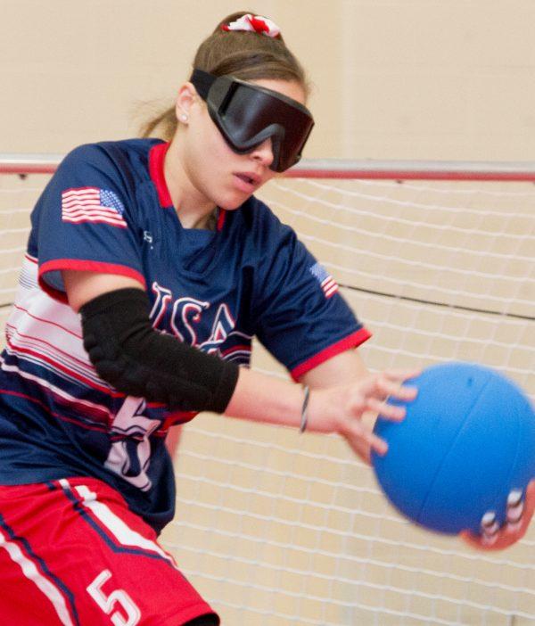 Amanda Dennis preparing to take a shot. (Courtesy of the United States Association of Blind Athletes)