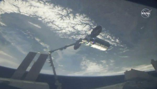 A cargo ship arrives at the International Space Station, on April 19, 2019. (NASA via AP)