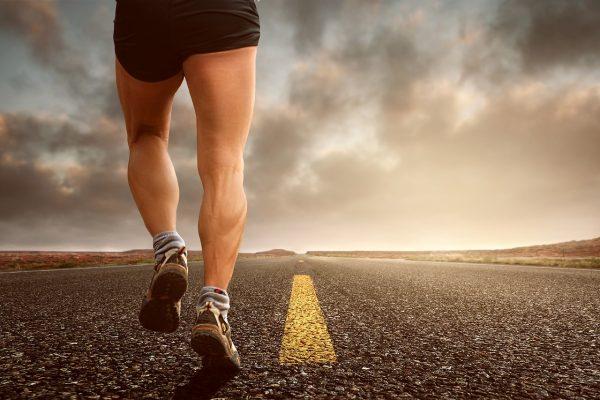 A man is pictured running on a road. (Pixabay)