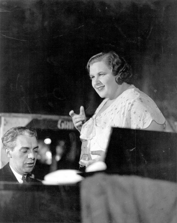 Kate Smith (1909-1986), the American singer who was a very popular radio performer in the 1930s and 1940s, is seen with Arthur Johnston, the composer, rehearsing, in a 1933 file photo. (Photo by Hulton Archive/Getty Images)