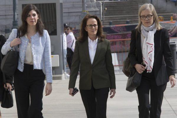 Kathy Russell (C), arrives at Federal court in the Brooklyn borough of New York, on April 19, 2019. (Mary Altaffer/AP Photo)