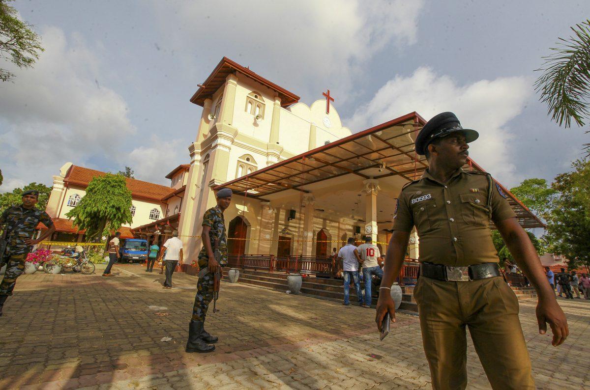 Sri Lankan army soldiers secure the area around St. Sebastian's Church damaged in blast in Negombo, north of Colombo, Sri Lanka, on April 21, 2019. (Chamila Karunarathne/AP)