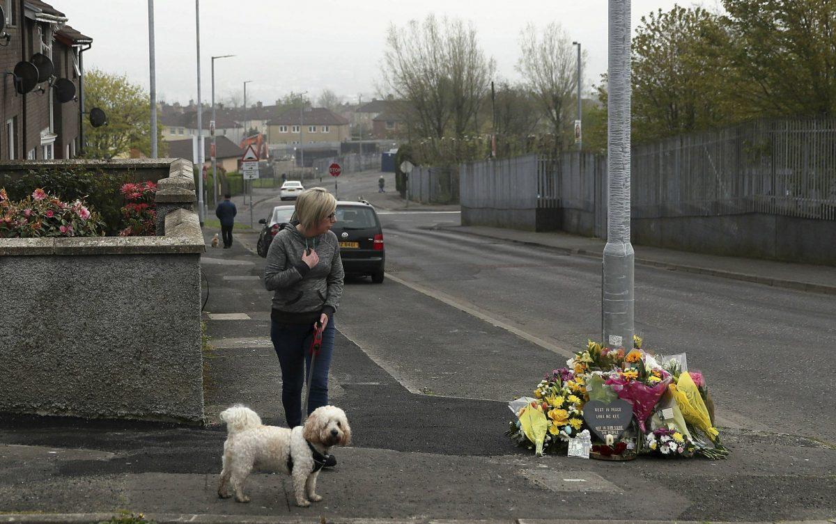 Police forensic officers at the scene in Londonderry, Northern Ireland, on April 19, 2019, following the death of 29-year-old journalist Lyra McKee who was shot and killed during overnight rioting. (Brian Lawless/PA via AP)