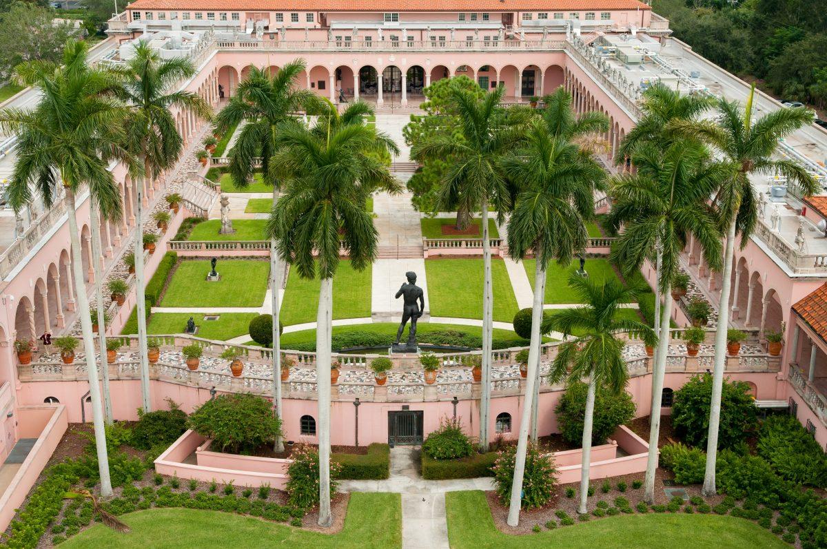 The John and Mable Ringling Museum of Art reflects the palaces of the Italian Renaissance with its rectangular buildings, pink color, and details in marble. (The John and Mable Ringling Museum of Art)