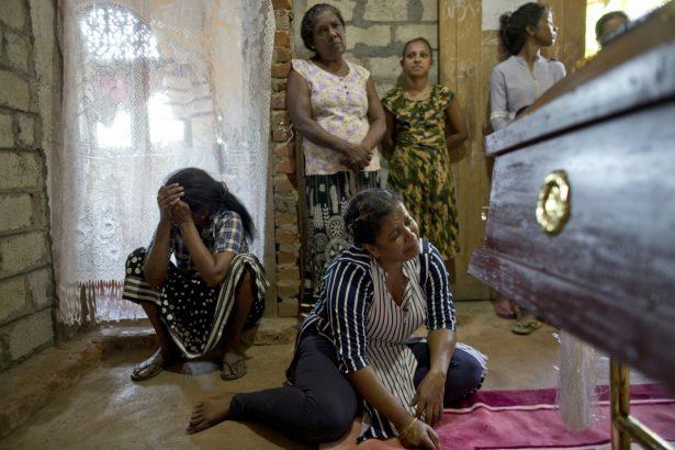 Relatives weep near the coffin with the remains of 12-year Sneha Savindi, who was a victim of the Easter Sunday bombing at St. Sebastian Church, in Negombo, Sri Lanka, on April 22, 2019. (Gemunu Amarashinghu/AP Photo)