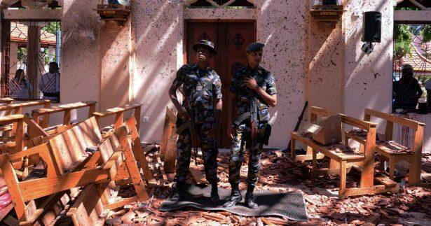 Sri Lankan military stand guard inside a church after an explosion in Negombo, Sri Lanka April 21, 2019. (Stringer/Reuters)