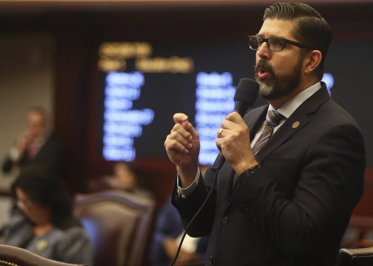 Florida Education Commissioner Manny Diaz has defended his department's new standards for teaching African American history. Here Diaz, then a Republican senator from Hialeah, speaks on the Senate floor in 2019. (Phil Sears/Photo via AP)
