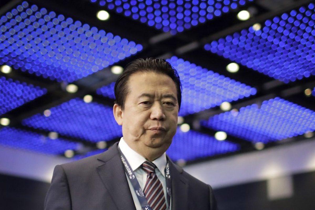 Interpol President Meng Hongwei walks toward the stage to deliver his opening address at the Interpol World Congress in Singapore on July 4, 2017. (Wong Maye/AP)